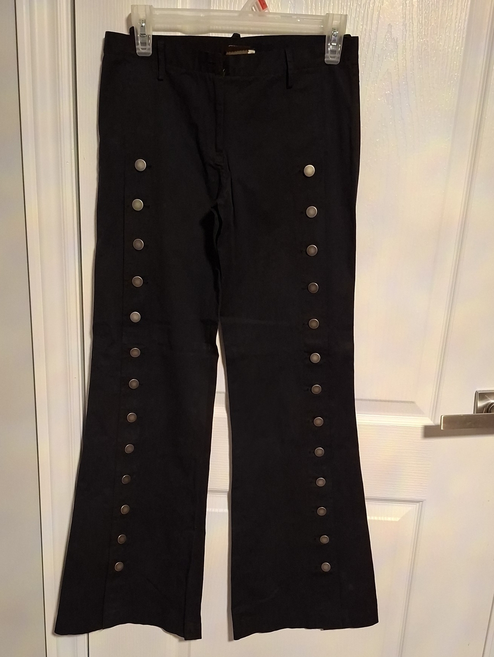 Black Flared Jeans with Decorative Button Trim